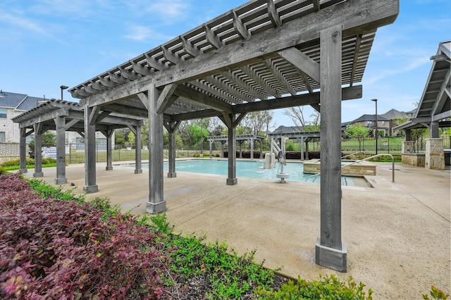 view of pool featuring a pergola and a patio area