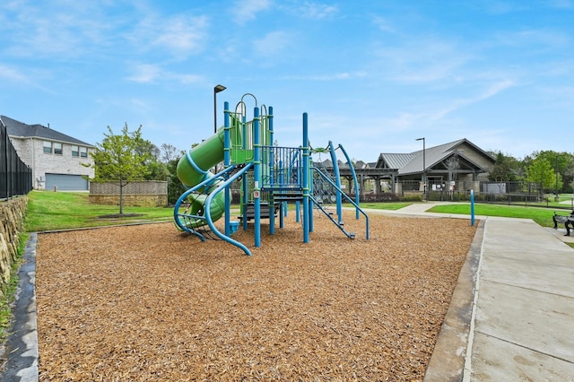 view of jungle gym featuring a yard