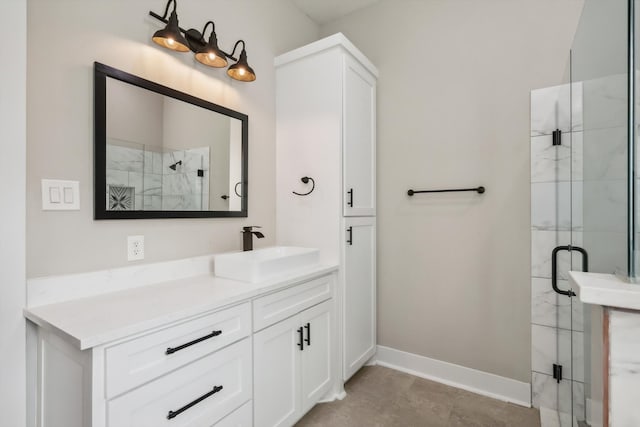 bathroom featuring walk in shower, tile patterned flooring, and vanity