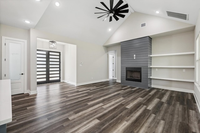 unfurnished living room with built in shelves, ceiling fan, a large fireplace, high vaulted ceiling, and dark hardwood / wood-style flooring