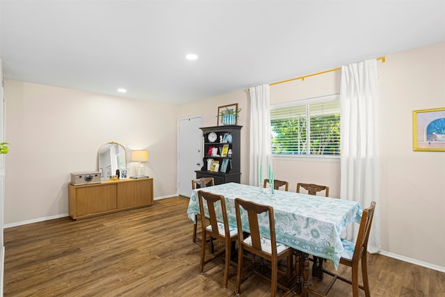 dining room featuring dark hardwood / wood-style flooring