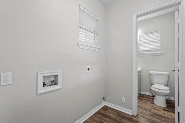 laundry room featuring dark hardwood / wood-style flooring, hookup for a washing machine, and hookup for an electric dryer