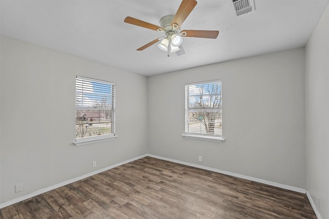 unfurnished room featuring ceiling fan and hardwood / wood-style floors