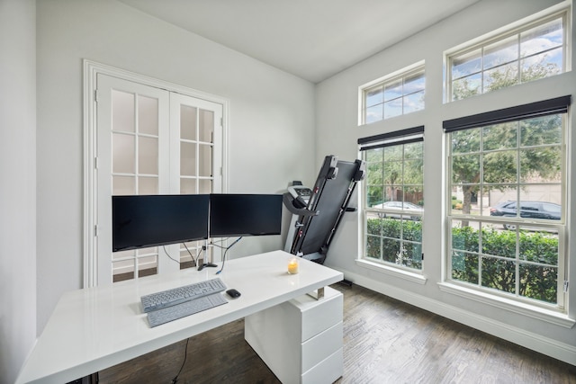 home office with hardwood / wood-style floors