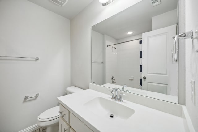 full bathroom featuring vanity, toilet, and bathing tub / shower combination