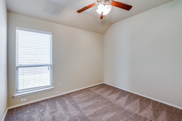 unfurnished room featuring ceiling fan, carpet flooring, and lofted ceiling