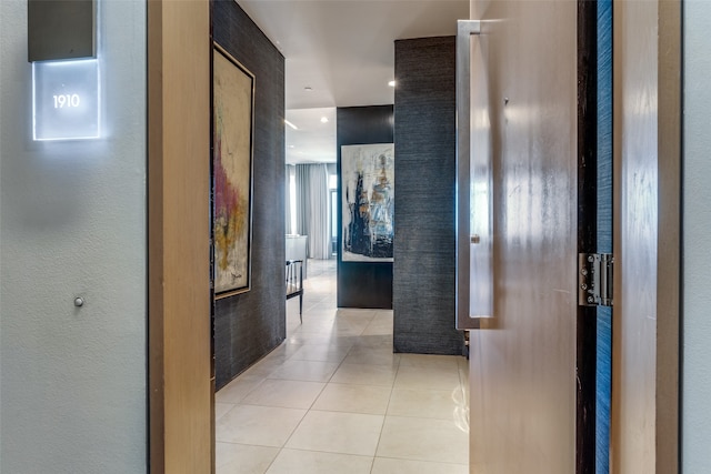 hallway with light tile patterned floors