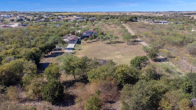 birds eye view of property featuring a rural view