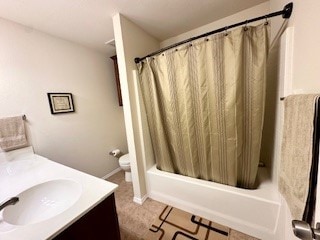 full bathroom featuring toilet, shower / tub combo, vanity, and tile patterned floors