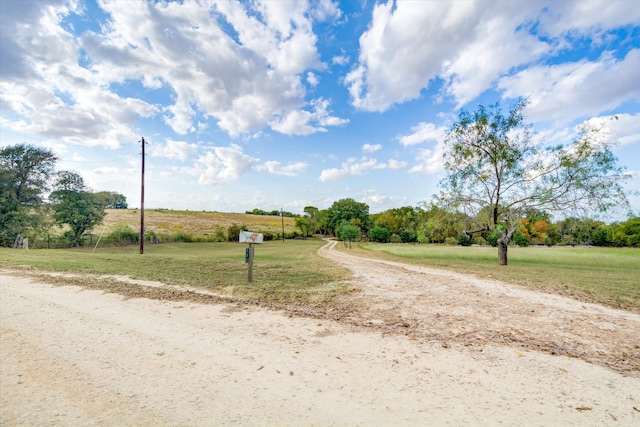 view of road featuring a rural view