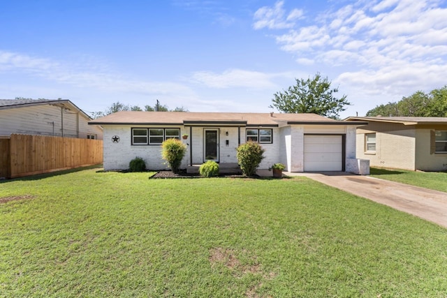 ranch-style house with a garage and a front yard