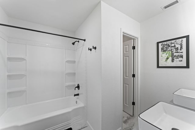 bathroom featuring  shower combination