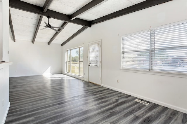 unfurnished living room featuring dark wood-type flooring, vaulted ceiling with beams, and ceiling fan