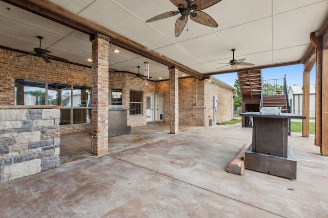 view of patio featuring ceiling fan