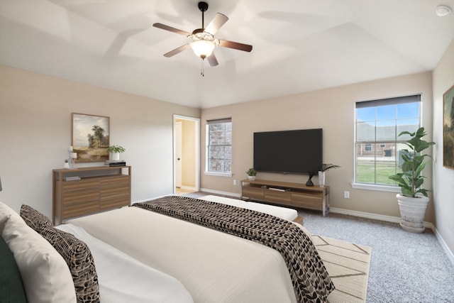 bedroom featuring carpet floors, ceiling fan, and lofted ceiling