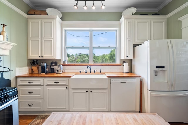 kitchen with sink, butcher block countertops, backsplash, white appliances, and ornamental molding