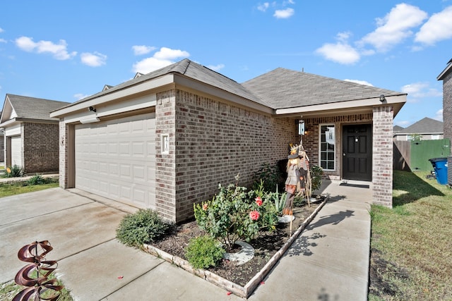 single story home with a garage