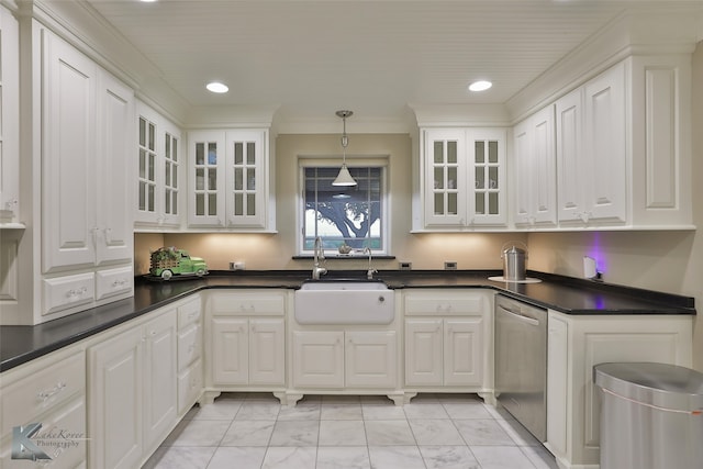 kitchen with decorative light fixtures, stainless steel dishwasher, sink, and white cabinets