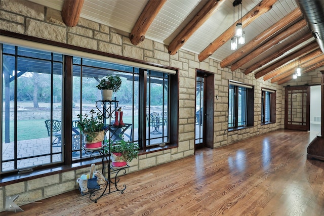 interior space with hardwood / wood-style flooring, vaulted ceiling with beams, and wooden ceiling