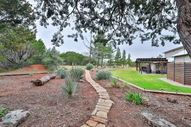 view of yard with a patio and a pergola