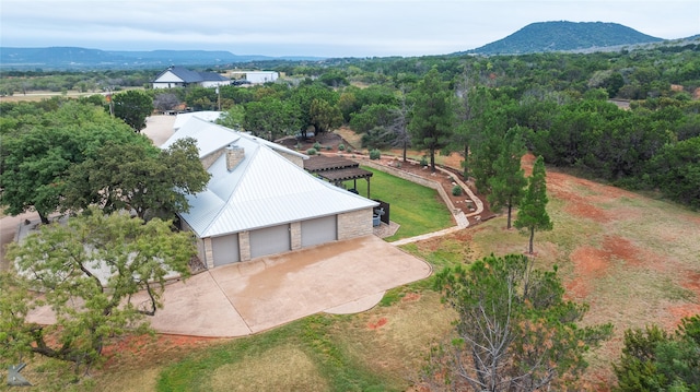 birds eye view of property featuring a mountain view