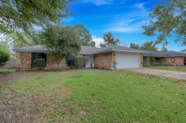 ranch-style house with a garage and a front yard