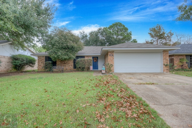 single story home featuring a garage and a front yard