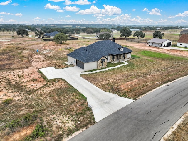 bird's eye view with a rural view