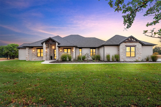 view of front of home featuring a yard