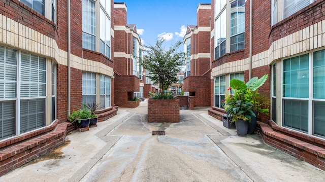 surrounding community with a patio area