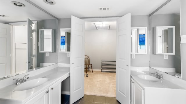 bathroom featuring vanity and tile patterned floors