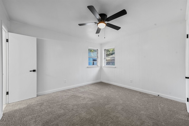 carpeted empty room with ceiling fan