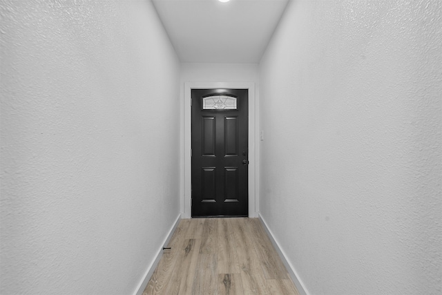 doorway featuring light hardwood / wood-style flooring