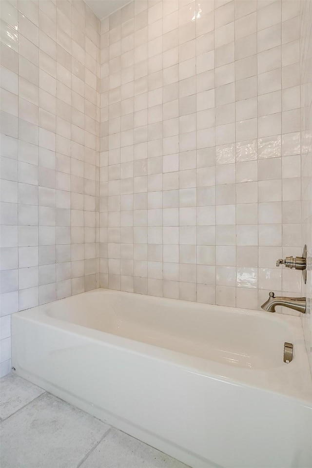 bathroom with a washtub