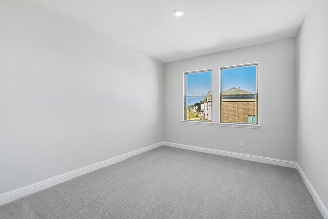 bedroom with light carpet and ceiling fan