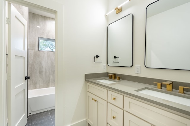 bathroom featuring vanity, tile patterned flooring, and bathtub / shower combination