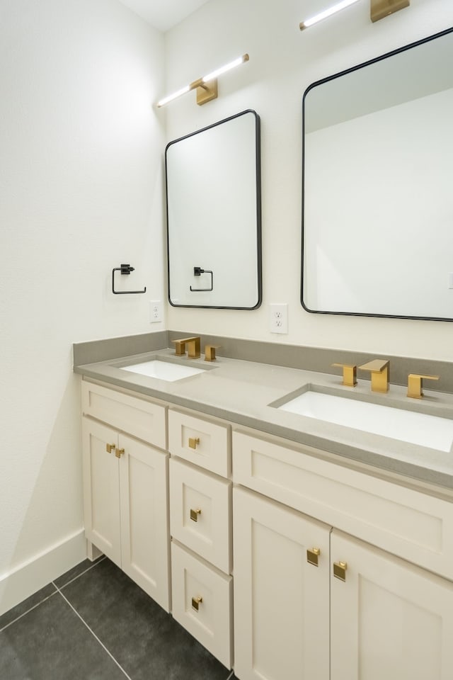 bathroom with vanity and tile patterned flooring