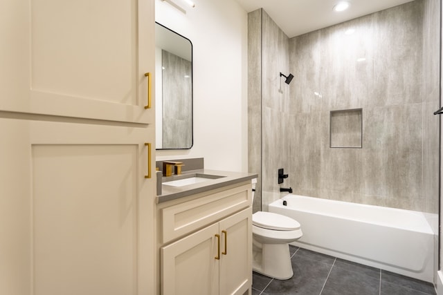 full bathroom with toilet, vanity, tile patterned flooring, and shower / washtub combination