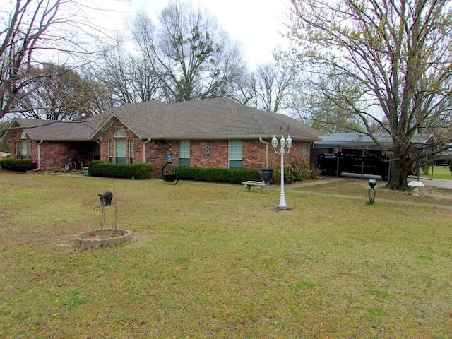 single story home featuring a front yard and a carport