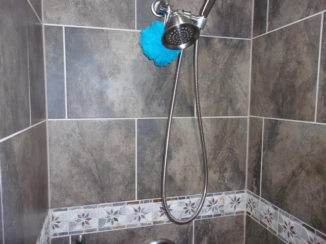 room details with a tile shower