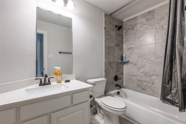 full bathroom with toilet, tiled shower / bath combo, and vanity