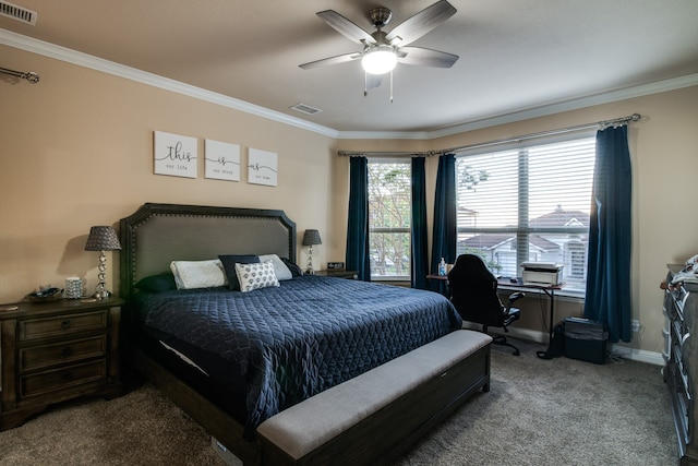 carpeted bedroom with ceiling fan and crown molding