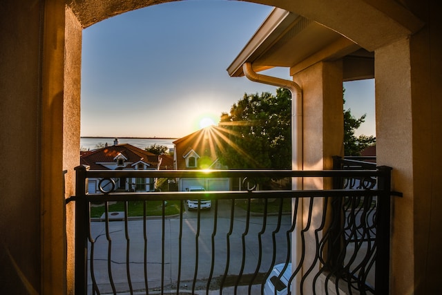 view of balcony at dusk