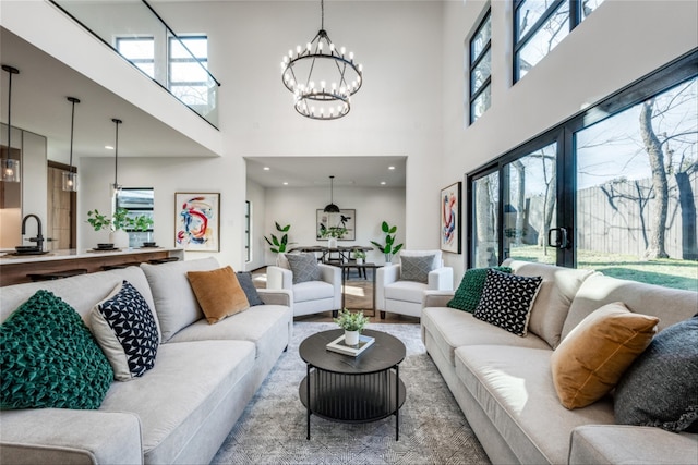 3050 Tall Oaks Ct, Corinth, TX 76210 - living room with a high ceiling and a chandelier