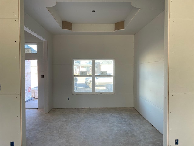 unfurnished room featuring plenty of natural light