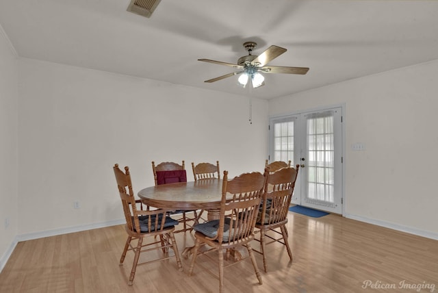 101 W Jefferson Ave, Haughton, LA 71037 - dining space featuring wood finished floors, french doors, ceiling fan, and baseboards
