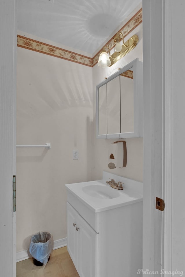 101 W Jefferson Ave, Haughton, LA 71037 - bathroom with vanity and baseboards