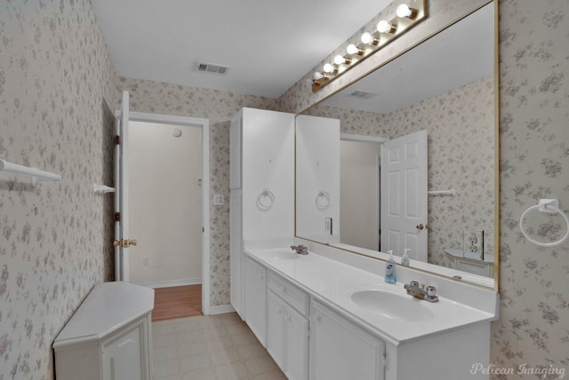 101 W Jefferson Ave, Haughton, LA 71037 - full bathroom featuring double vanity and tile patterned floors