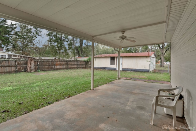 view of patio featuring ceiling fan