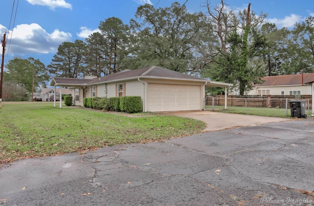 101 W Jefferson Ave, Haughton, LA 71037 - view of front facade with driveway and a garage